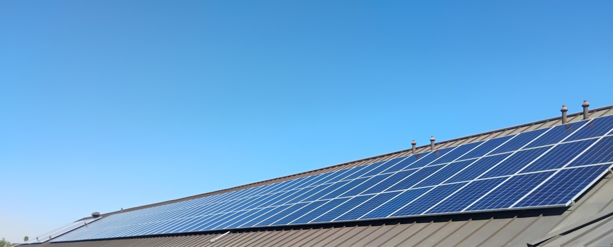 Spotless Solar cleaning professionals at work